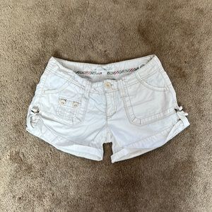 More of a 2000s cargo shorts, white with tan stitching